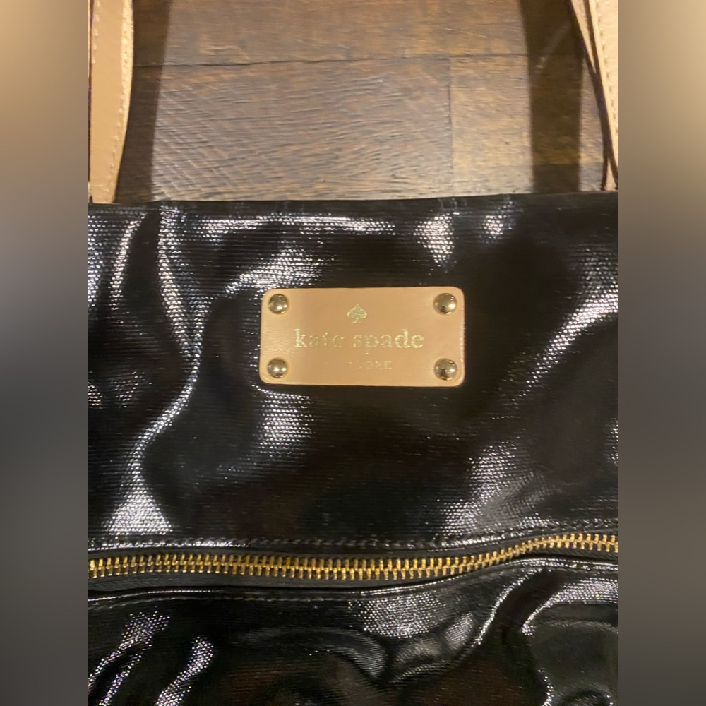 Kate Spade black vinyl shoulder purse.